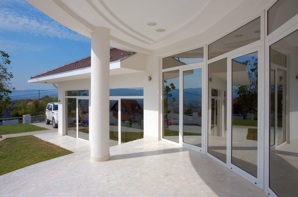 Picture of a luxury home looking at the tinted windows