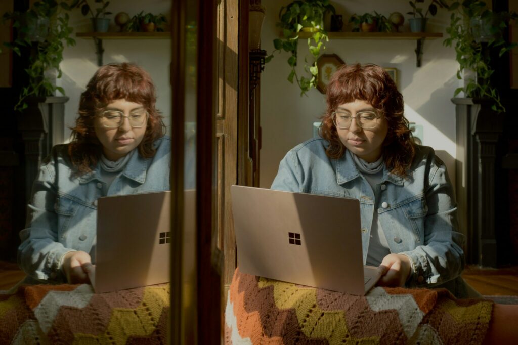 Woman Working on Computer In Home Office